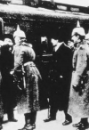 The Soviet delegation arrives at Brest-Litovsk. Lev Trotsky is in the center surrounded by German officers
