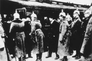 The Soviet delegation arrives at Brest-Litovsk. Lev Trotsky is in the center surrounded by German officers
