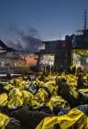 Syrian refugees on an Italian navy ship after being rescued