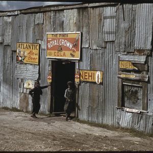 African American migratory workers in front of a 'juke joint' in Belle Glade, Florida (February 1941)